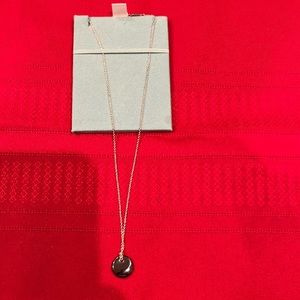 Tiffany and Co Necklace and Pendant Elsa Peretti round pendant necklace.New